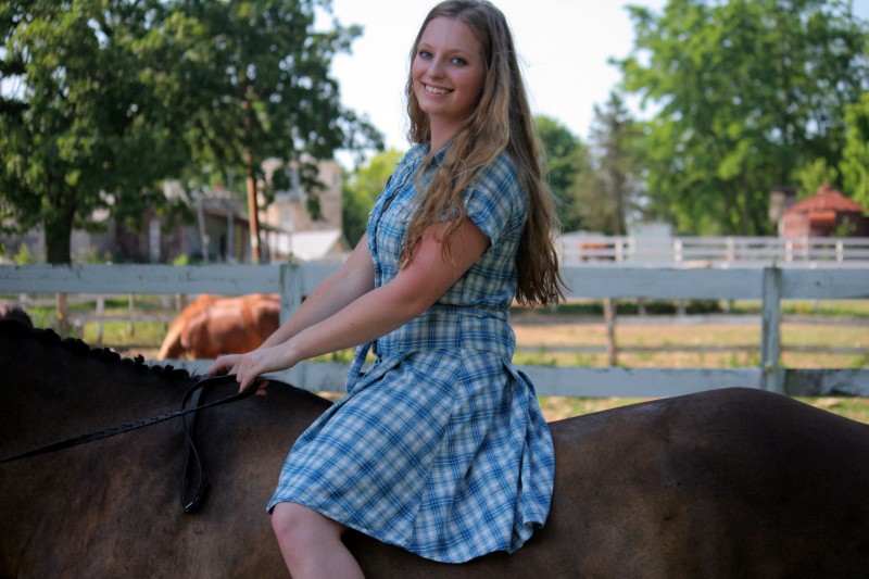 Two girls and two horses