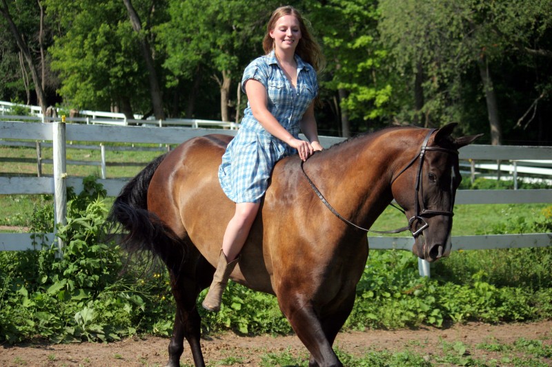 Two girls and two horses