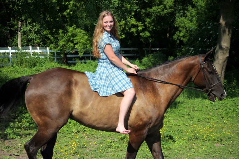 Two girls and two horses