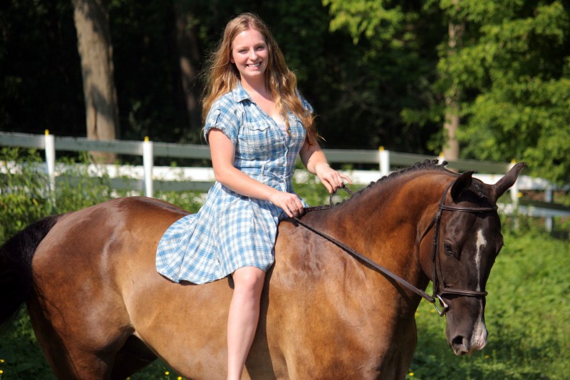 Two girls and two horses