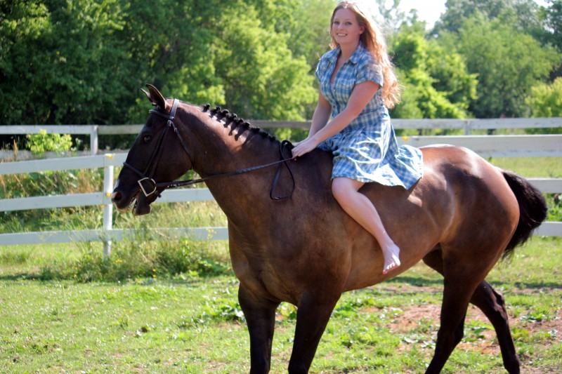 Two girls and two horses