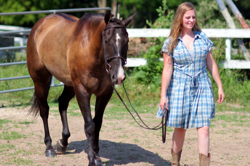 Two girls and two horses